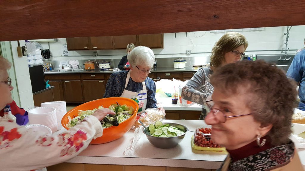 Neighbors Gather for Dinner - What it looks like to feed and serve our small neighborhood a meal. Ideas to inspire you to gather your community of neighbors at the table for dinner.