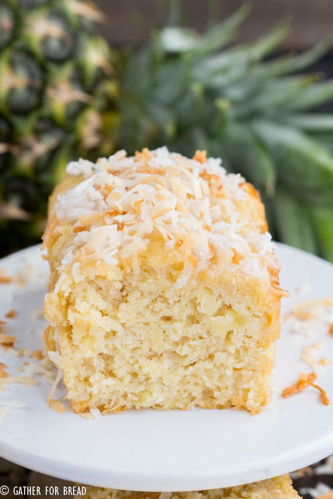 Pina Colada Quick Bread - Moist mini loaves with pineapple, coconut cream for a fresh Hawaiian taste of the tropics in a quick easy batch of bread. Decadent, moist and delicious, you'll be mix and make this often if you love the tropical taste.