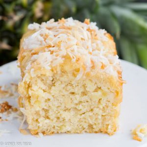 Pina Colada Quick Bread - Moist mini loaves with pineapple, coconut cream for a fresh Hawaiian taste of the tropics in a quick easy batch of bread. Decadent, moist and delicious, you'll be mix and make this often if you love the tropical taste.
