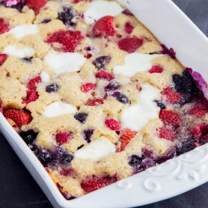 Berry Cream Cobbler- Lighter, healthy, low-fat cobbler recipe mad easy with Greek yogurt, white whole wheat flour, less sugar. Mixed berries, blueberry, strawberry, raspberry. You won't miss the old fashioned version.