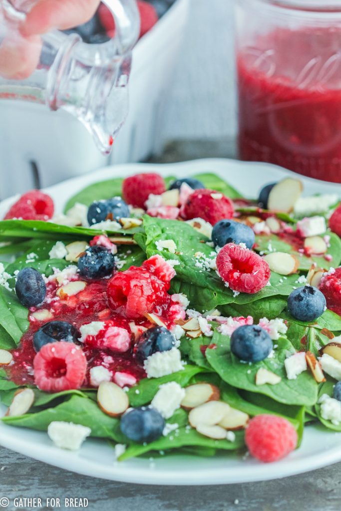 Raspberry Vinaigrette Salad Dressing - Easy seasonal fresh berry dressing recipe is made with real wholesome, healthy ingredients. It's clean and refined sugar free. Perfect for topping your favorite salad greens or spinach.