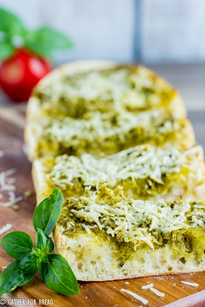 Cheesy Pesto Bread - Italian Bread made with Pesto and Parmesan cheese. Easy recipe, ready in minutes as an appetizer or side dish. Perfect for potlucks or picnics.