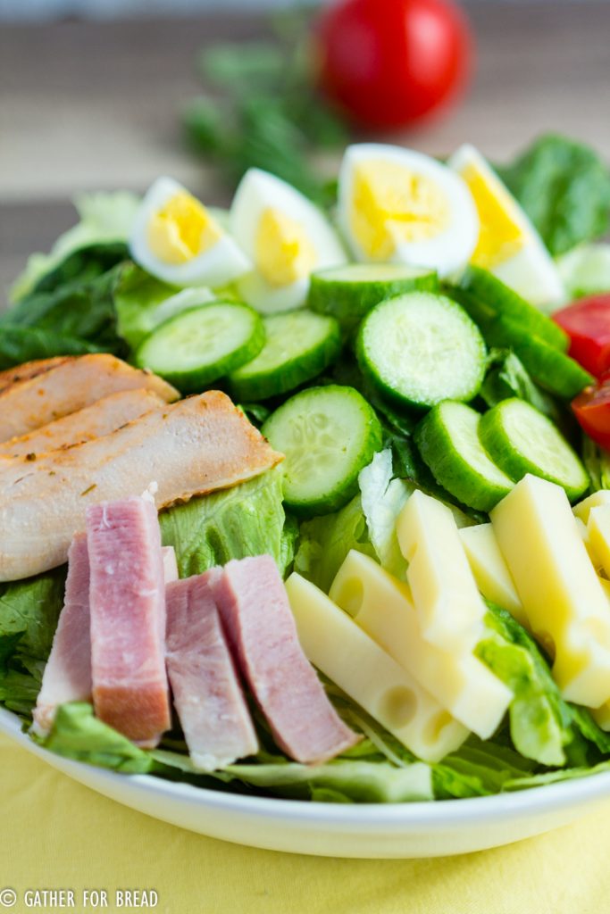Chef's Salad Recipe - Homemade chef's salad made with Romaine lettuce, ham, turkey and chopped vegetables. Delicious ingredients for an easy salad made in minutes.