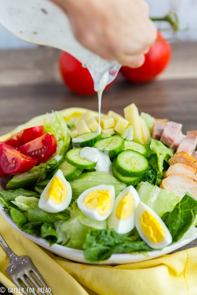 Chef's Salad - Popular American salad with ham, turkey cheese, hard boiled eggs, tomatoes cucumbers on a bed of lettuce. It's got color, crunch and it tastes AMAZING!!