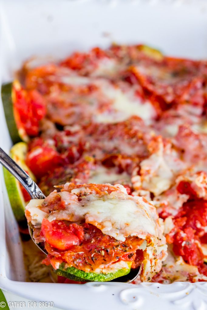 Zucchini Mozzarella Casserole - Recipe for cheesy zucchini casserole. With diced tomatoes, mozzarella cheese and pepperoni, this squash bake will be a family favorite summer side dish.