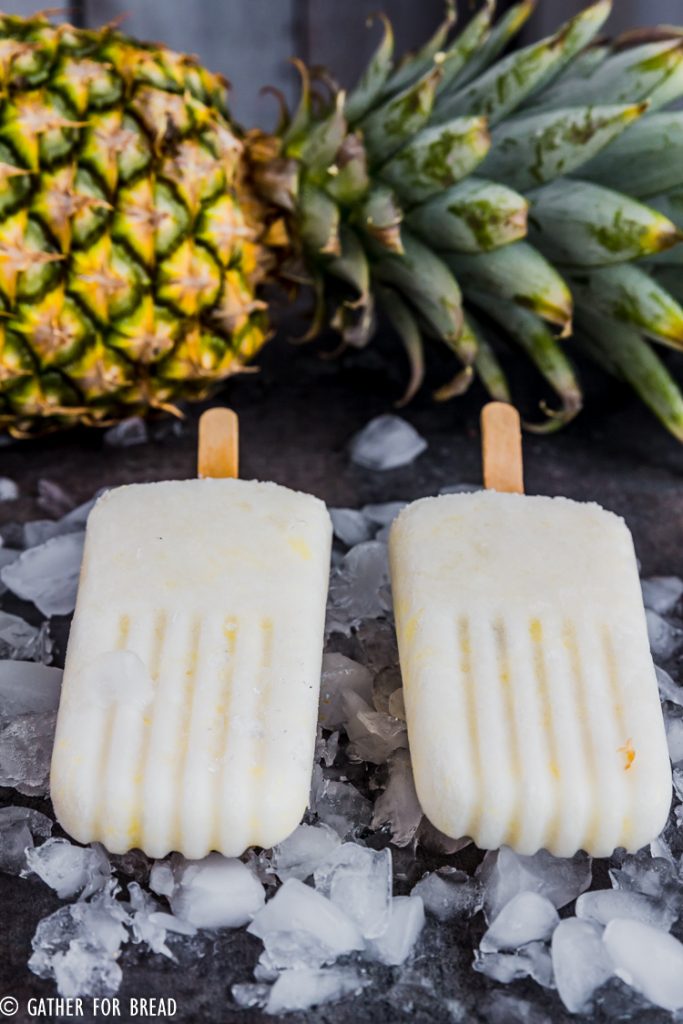 Pina Colada Popsicles - Cold refreshing pops, a perfect cold treat for summer. Make popsicles at home with REAL coconut milk, pineapple and coconut flakes for a healthy summer snack.