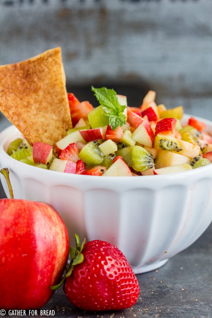 Apple Berry Salsa - Homemade fruit salsa made with strawberry, apple and kiwi paired with fresh warm cinnamon chips for a delicious appetizer or snack.