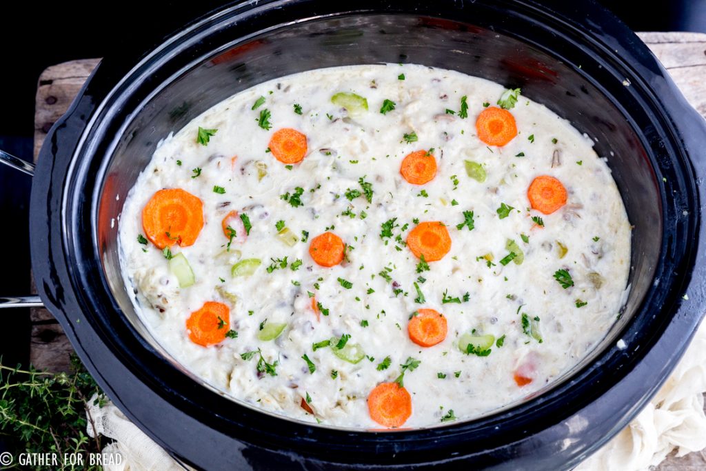Slow Cooker Creamy Chicken Wild Rice Soup - Crockpot chicken wild rice soup, creamy chowder style soup. Homemade with boneless chicken and rice. Perfect comfort food for a chilly night. Serve with your favorite bread for a full meal!