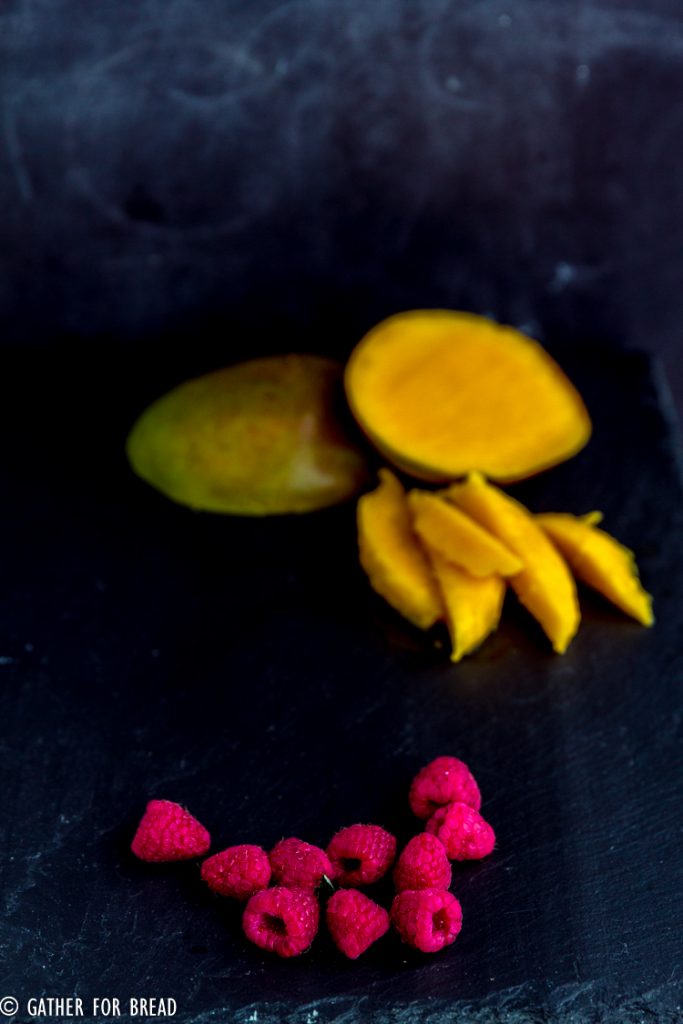 Mango Raspberry Smoothie - How to make this nutritious mango smoothie with berries and tropical flavors. It's the perfect healthy way to go.  delicious and smooth, made without yogurt!