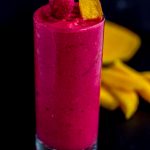 Mango Raspberry Smoothie - How to make this nutritious mango smoothie with berries and tropical flavors. It's the perfect healthy way to go.  delicious and smooth, made without yogurt!